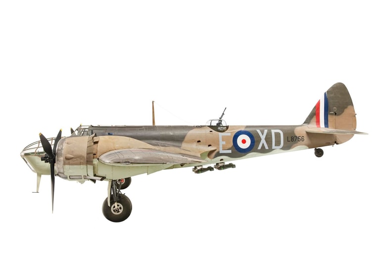 Twin engine aircraft with propellers and camouflage pattern, © RAF Museum